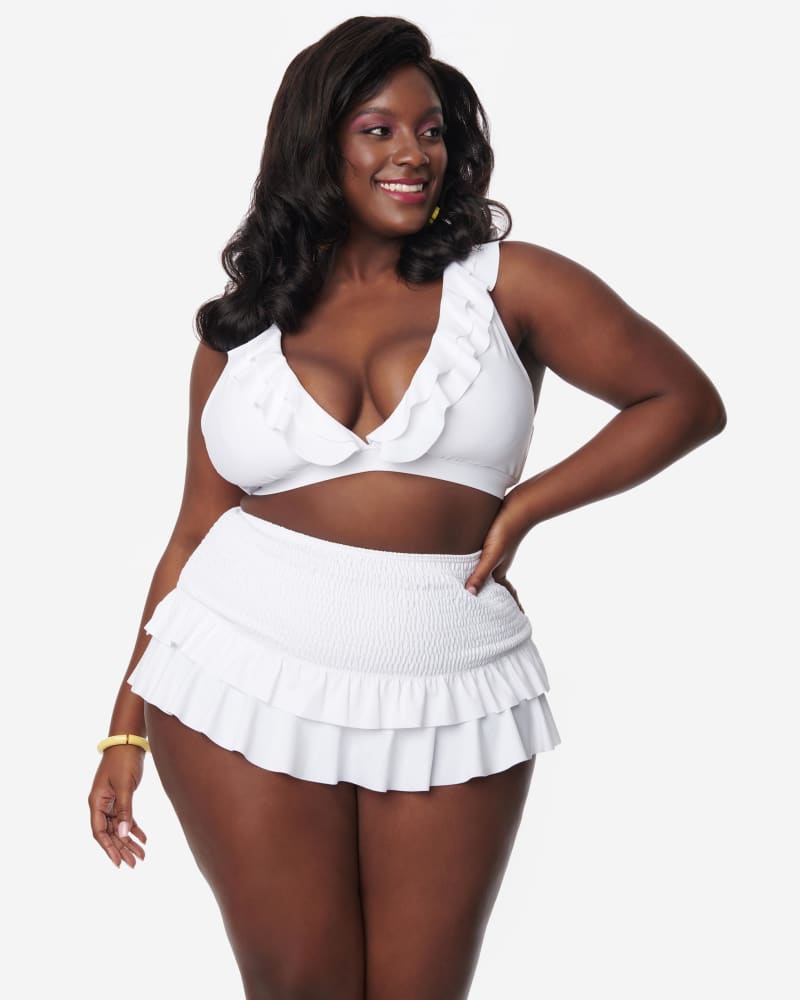Front of a model wearing a size 2X Unique Vintage White Ruffle Halter Swim Top in White by Unique Vintage. | dia_product_style_image_id:288376